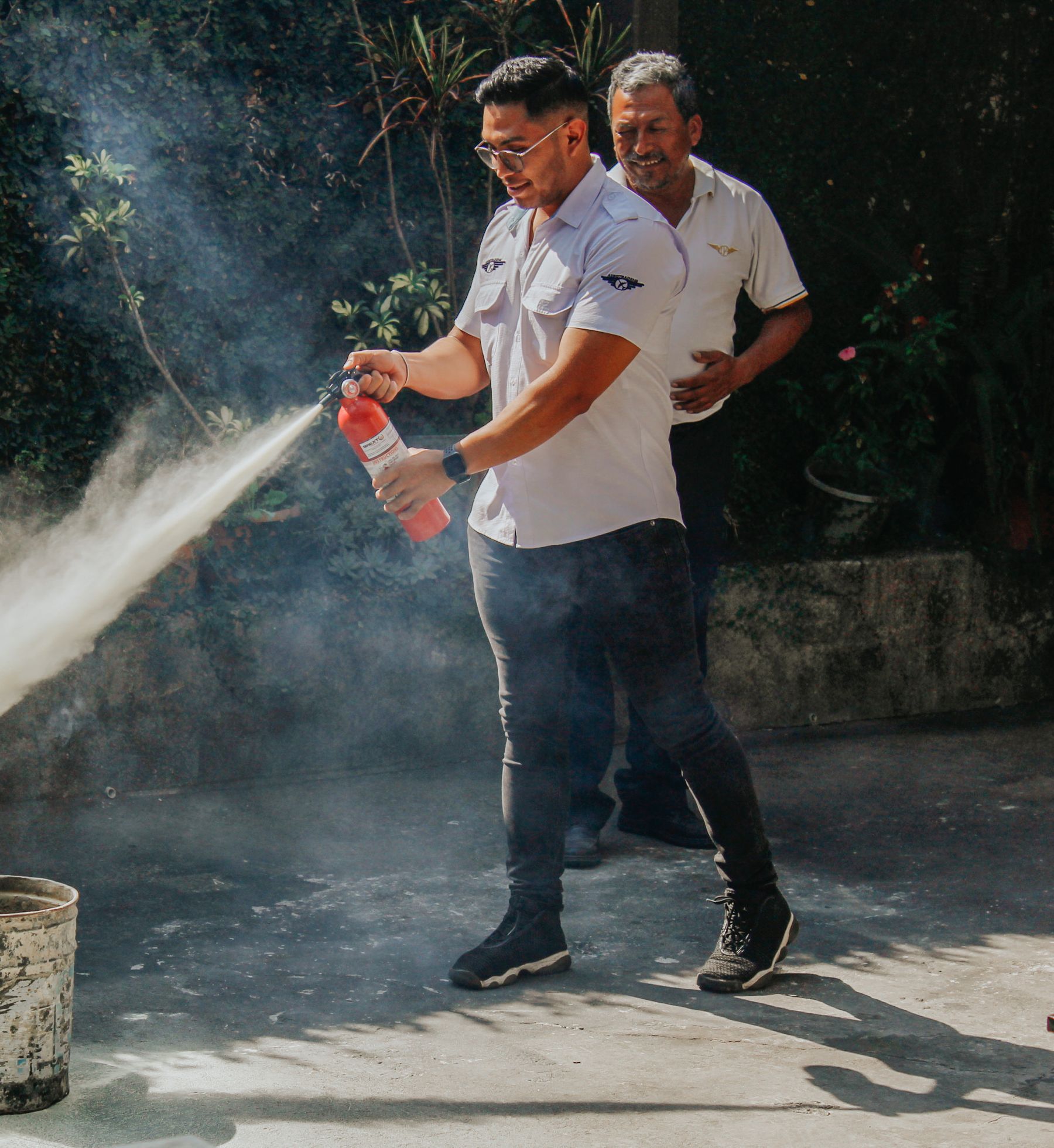 Workplace fire-extinguisher training demonstration