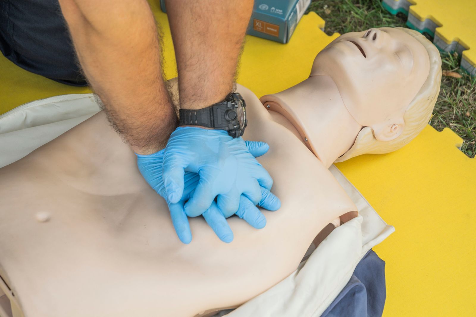 First-aid training using a CPR manikin